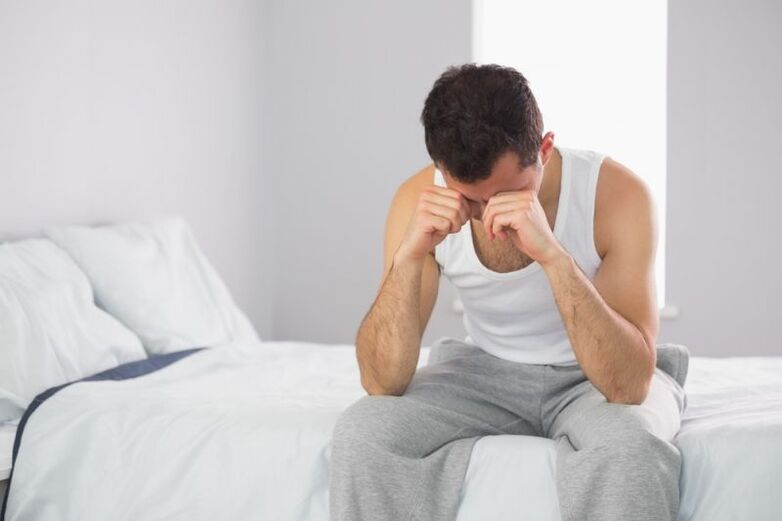 Un hombre en la cama
